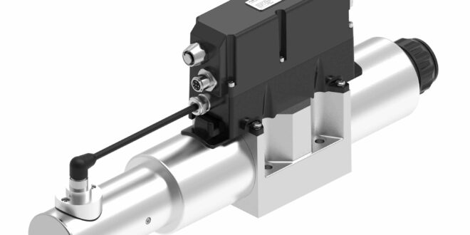 Four-way hydraulic valve features a round solenoid design