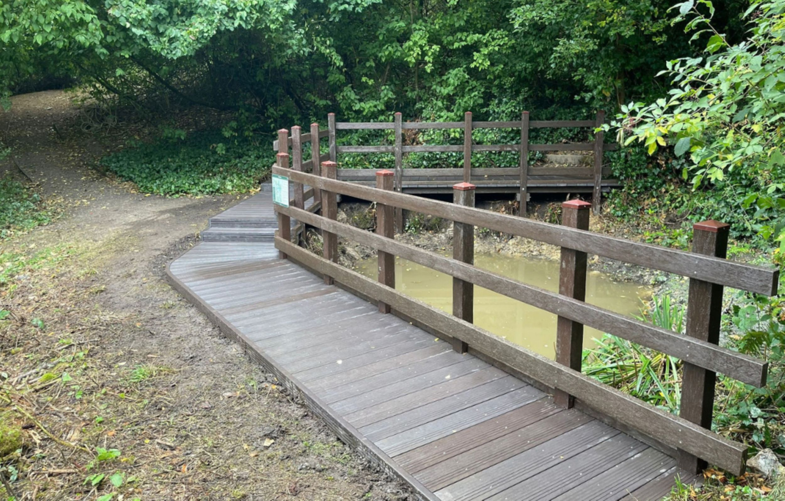 Amcor recycled plastic boardwalk restores school pond access